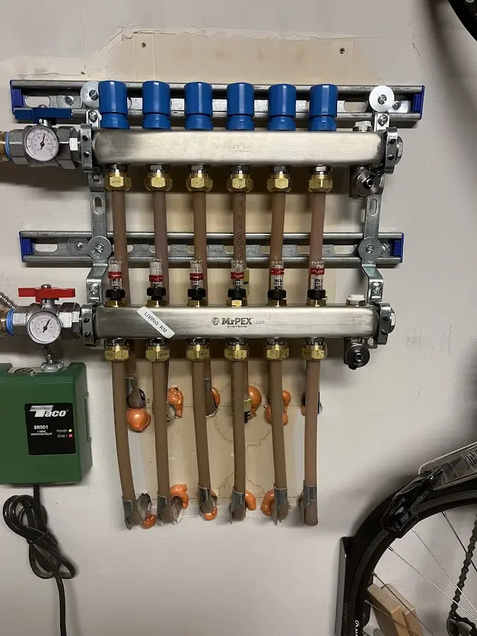 Plumber performing Leak Detection at a residential property in Kennett Square